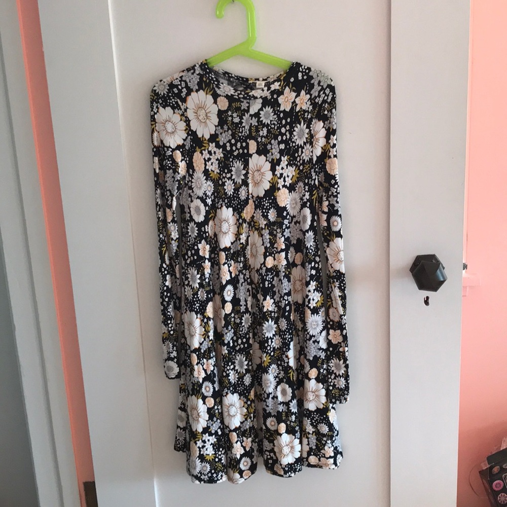 Black kids dress with pink and yellow flowers.